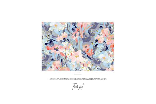 Jersey fabric mockup featuring a colorful mix of blue, pink, and yellow flowers, shown from a top view.