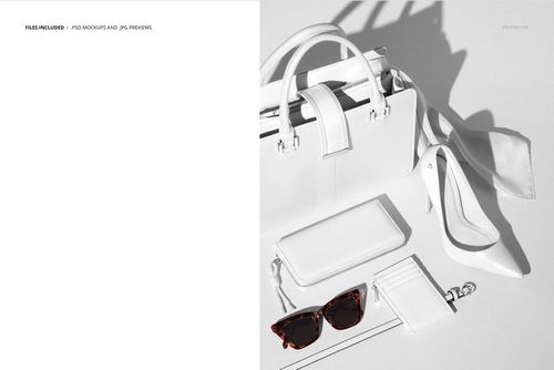 PSD mockup showing a collection of women's leather goods and a silk scarf in white tones with strong shadows.