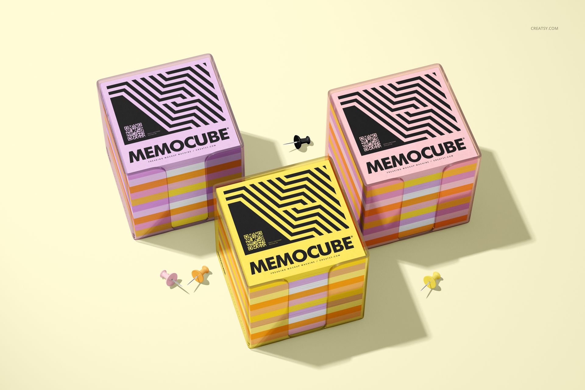 PSD mockup featuring three memo block cubes in acrylic holders, arranged on a pale background with scattered push pins.
