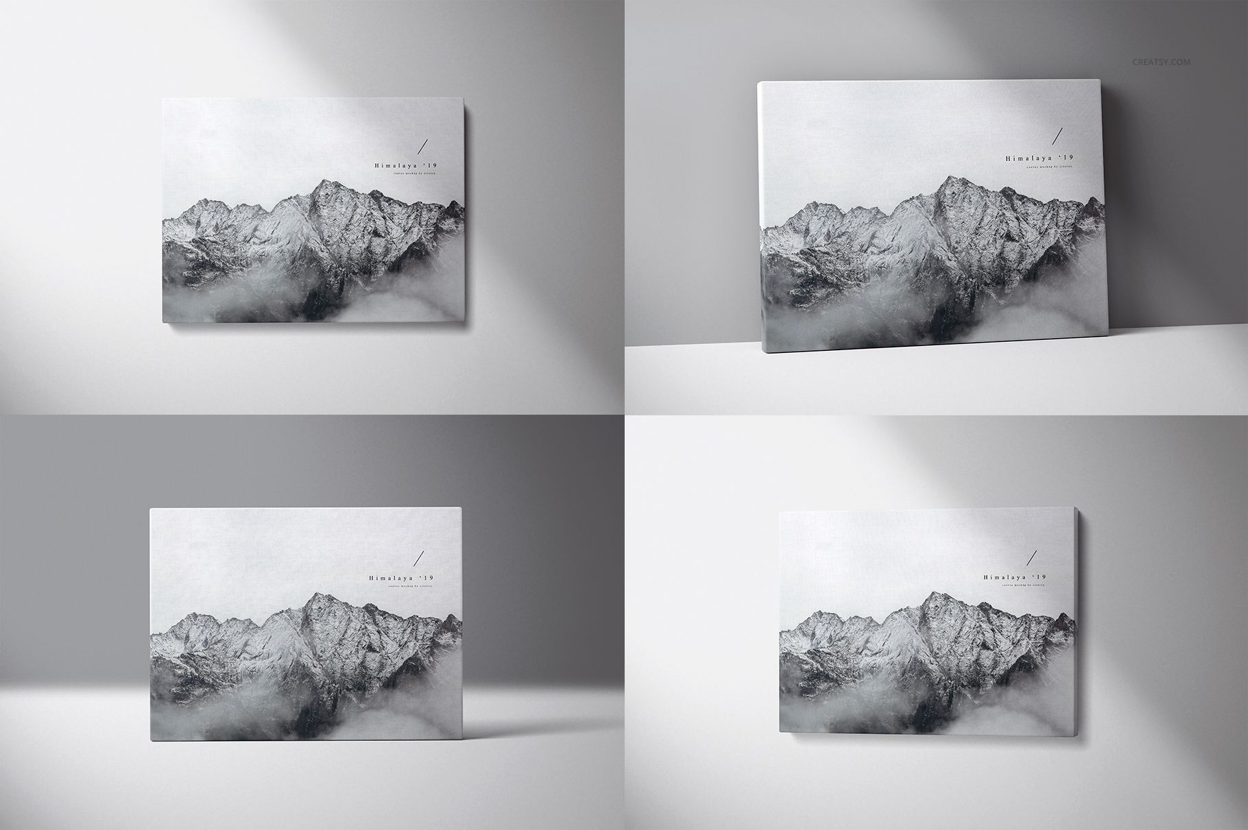 PSD mockup showing multiple canvas prints with a misty mountain scene, presented in various wall-mounted positions.