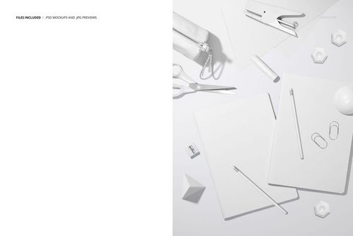 PSD mockup scene featuring two A4 notebooks with assorted white stationery items such as scissors, stapler, and pencil case.