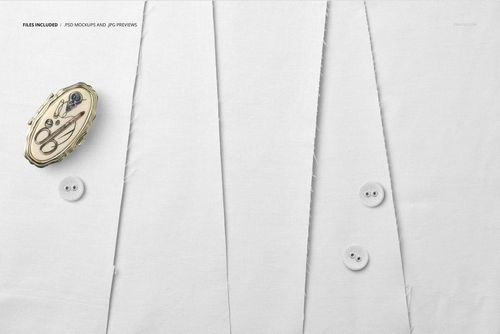 Cotton fabric sample mockup with white textile panels, two white buttons, and a sewing-themed brooch, top view.