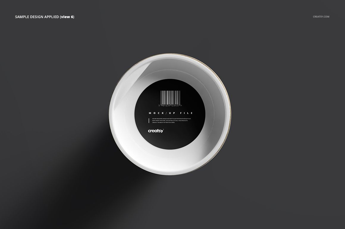 Mailing tube mockup in PSD format, showing a circular lid with a black center label, set against a gray surface.