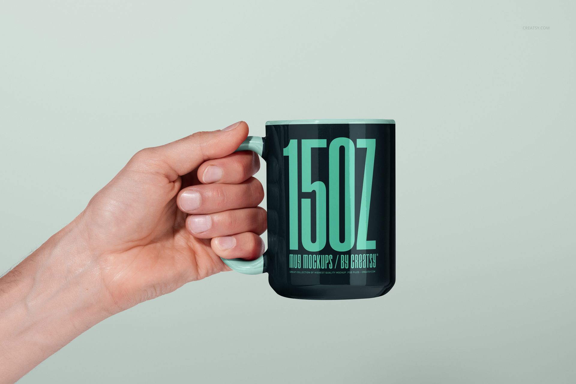 PSD mockup featuring a 15oz ceramic mug with a mint green handle and rim, displayed against a pale background.