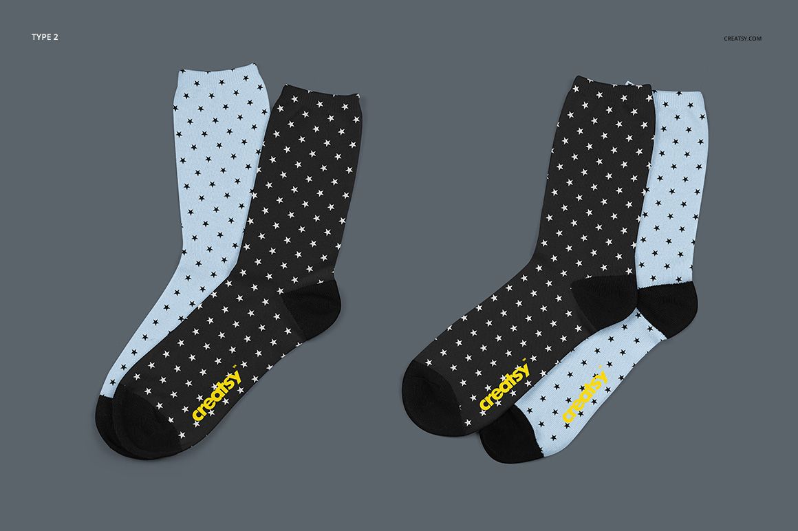 Sublimation socks mockup showing two types with star designs, black toes and heels, arranged on a plain gray surface.