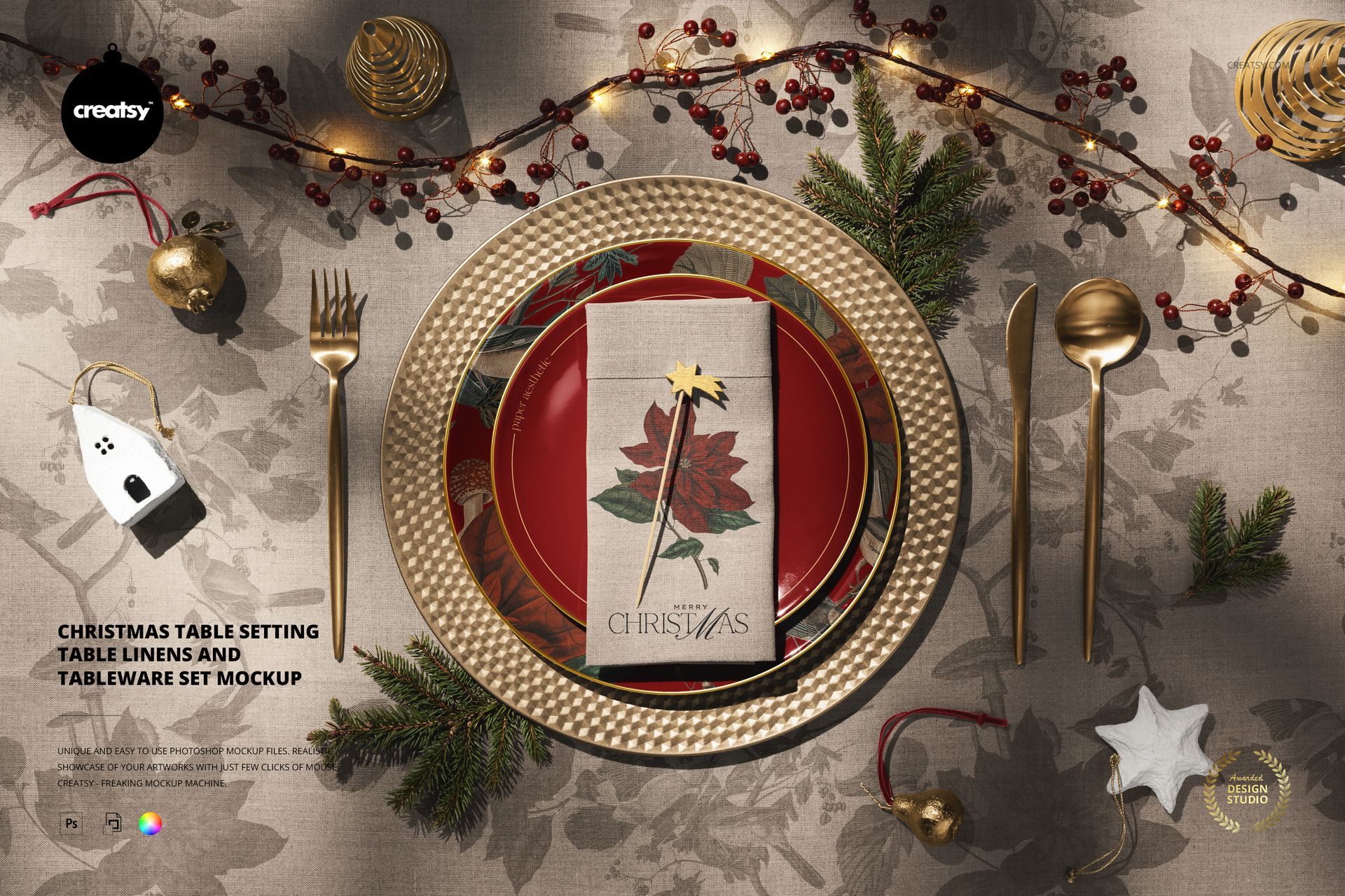 Top view of a Christmas-themed tableware set mockup featuring gold cutlery, plates, and a poinsettia napkin.