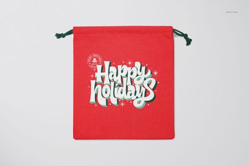 Christmas-themed PSD mockup of a red sack with decorative lettering and green drawstrings, shown from above.