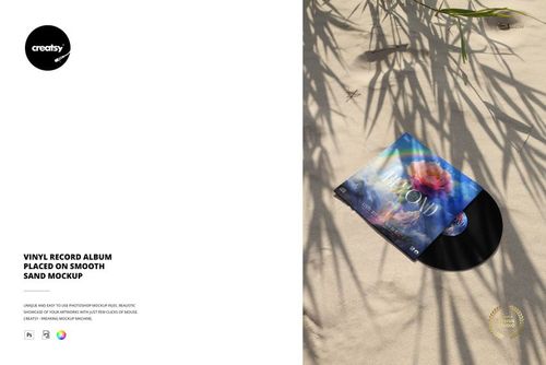 PSD mockup showing a vinyl record and album sleeve on sunlit sand, surrounded by natural leaf shadows.