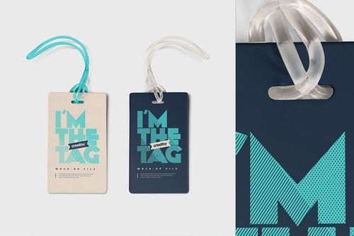 Luggage tag PSD mockup set featuring beige and navy tags with turquoise accents, displayed on a neutral white surface.