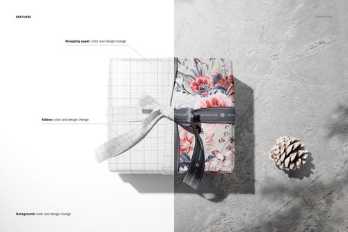 PSD mockup featuring gift boxes with contrasting wrapping papers and ribbons, placed on a gray surface with a pine cone.