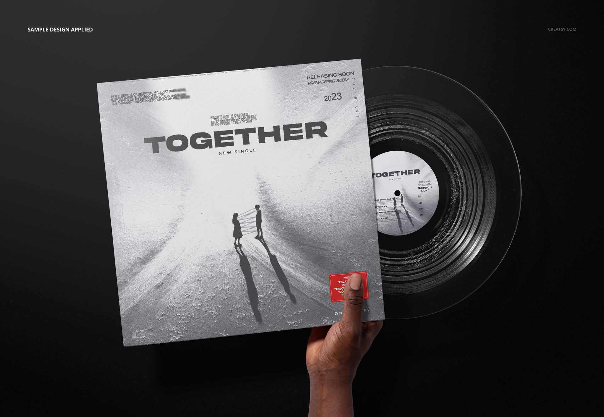 PSD mockup of a transparent vinyl record in a modern album cover, held against a dark background, viewed from the front.