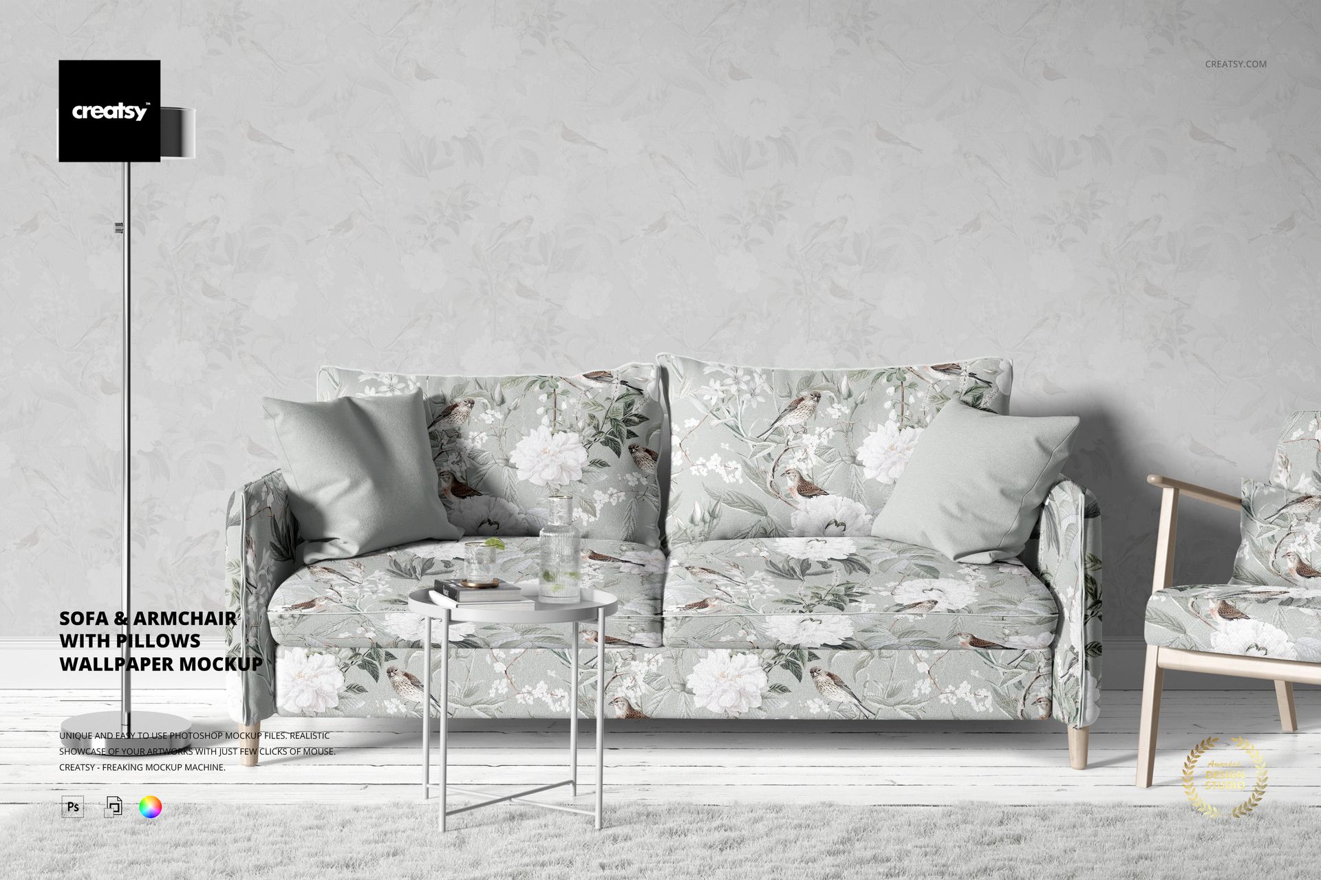 Front view of a floral-patterned sofa and armchair with light pillows against a subtle wallpaper in a living room mockup.