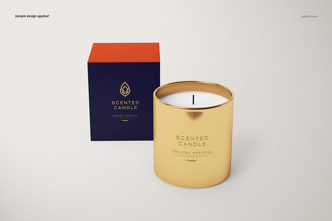 Classic candle mockup featuring a gold metallic jar and white wax, with a square navy and orange candle box beside it.