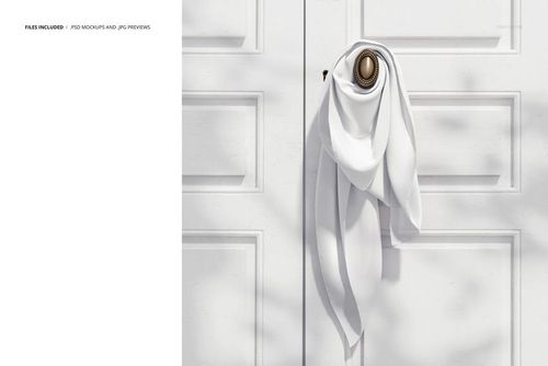 White silk scarf tied around a round brass door handle on a paneled white door, shown in a front view mockup scene.