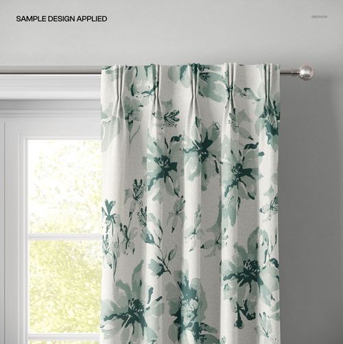 PSD mockup of pleated curtain featuring watercolor-style green flowers, displayed in a bright interior setting.