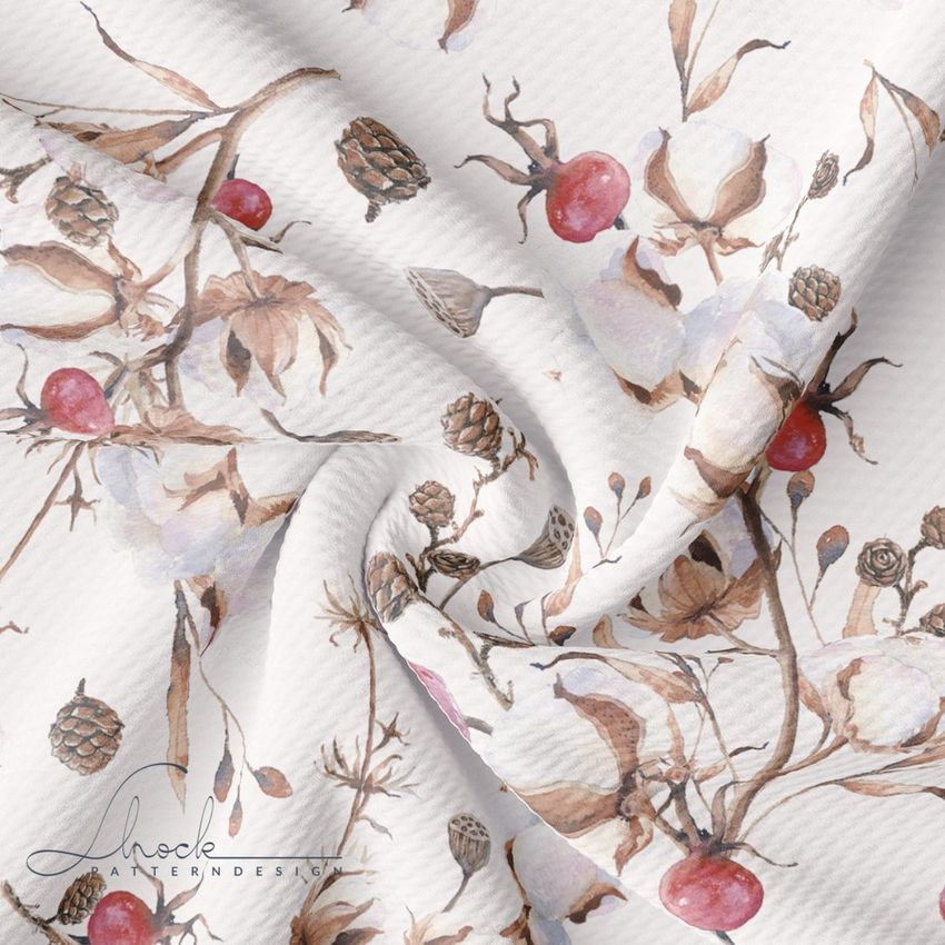 Fabric mockup featuring a seamless floral and botanical pattern with cotton, rose hips, and pinecones in soft brown and red tones.