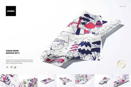 Folded tissue paper with colorful abstract and botanical illustrations, displayed on a white surface in a PSD mockup scene.