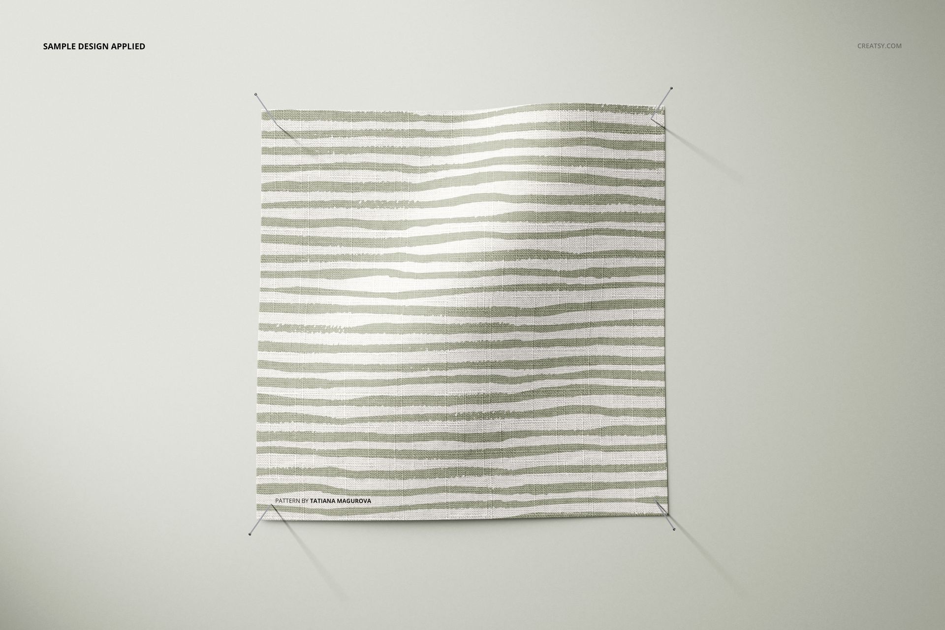 Fabric swatch mockup featuring a striped beige and white pattern, displayed flat and pinned against a light background.
