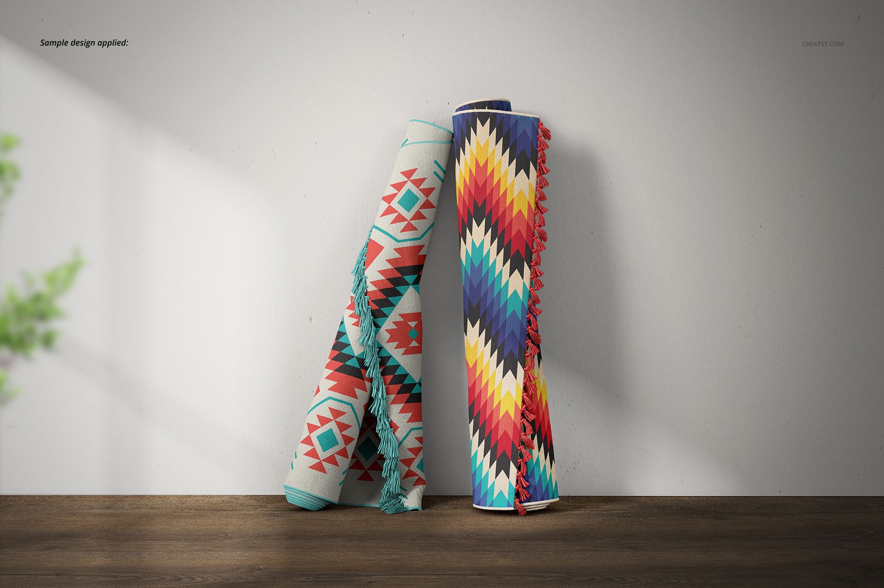 Fringed rugs mockup showing two rugs with bold, angular designs and shadows, placed upright against a neutral wall.