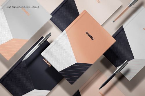 Notebook mockup set featuring various closed and open notebooks with geometric patterns, displayed with pens from above.