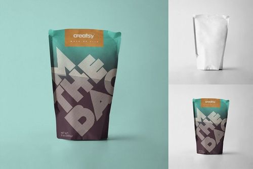 Front view of a paper bag packaging mockup with bold geometric design, teal and brown colors, and a flat base on a light blue background.