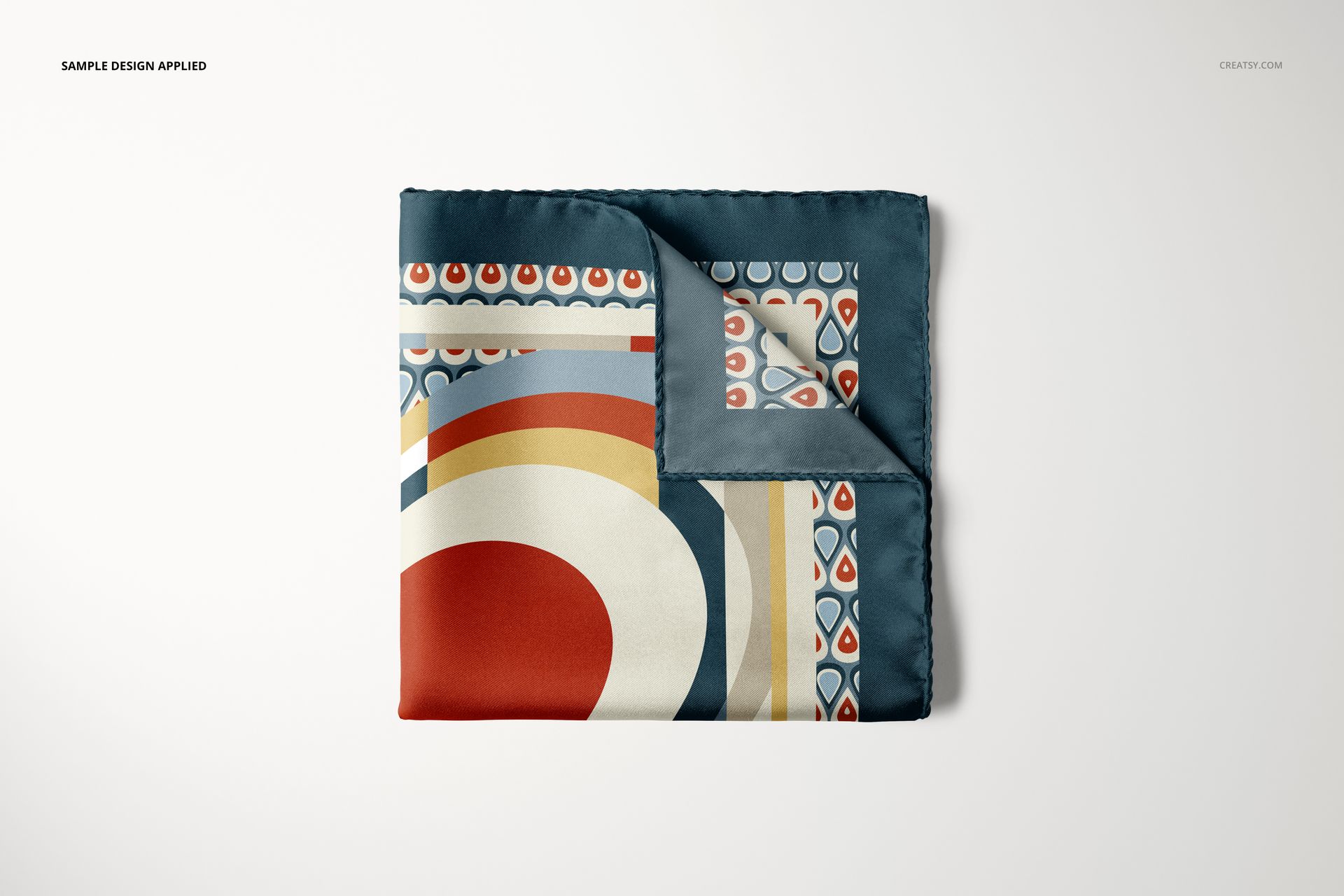 Pocket square mockup with bold abstract shapes and retro colors, displayed flat against a light background.