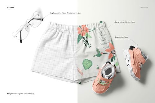 Front view of baby and kids shorts mockup with a floral pattern, placed beside peach sneakers and white sunglasses.