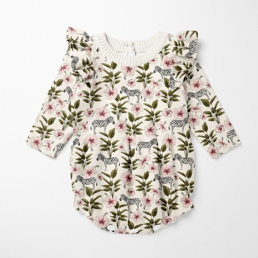 Knitted romper mockup featuring a long-sleeve baby outfit with a flower and zebra pattern on a white background.