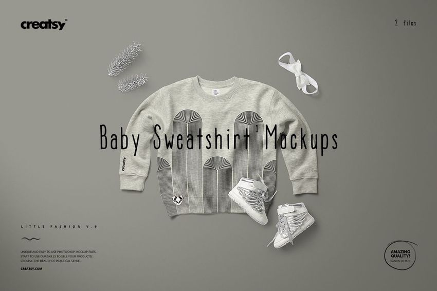 Front view of a heather baby sweatshirt mockup with geometric arches, laid out with shoes and decorative props.
