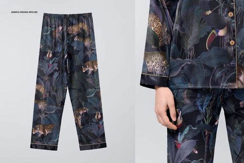 Silk long-sleeve pyjama set mockup featuring dark jungle-themed pattern with animals and foliage, shown in front view.