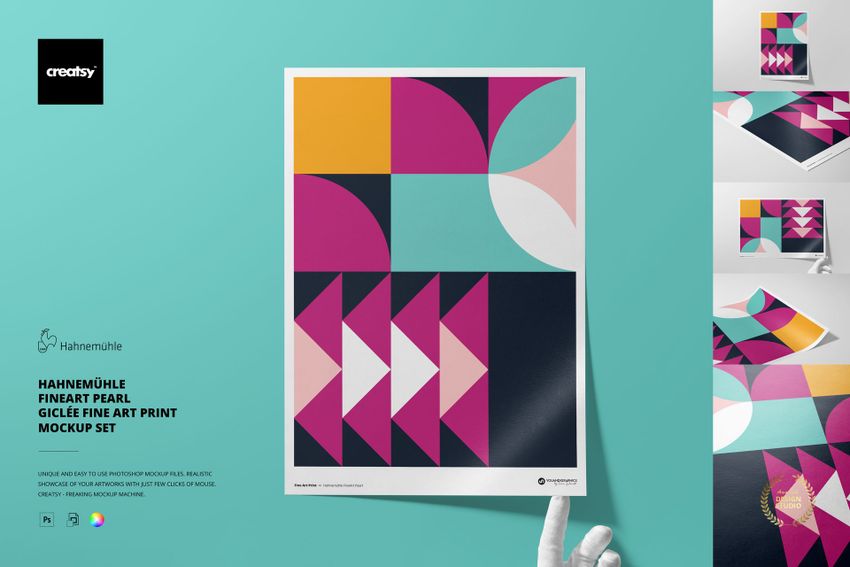 Colorful geometric pattern art print displayed upright, with gloved hand holding the bottom edge, mockup set visible.