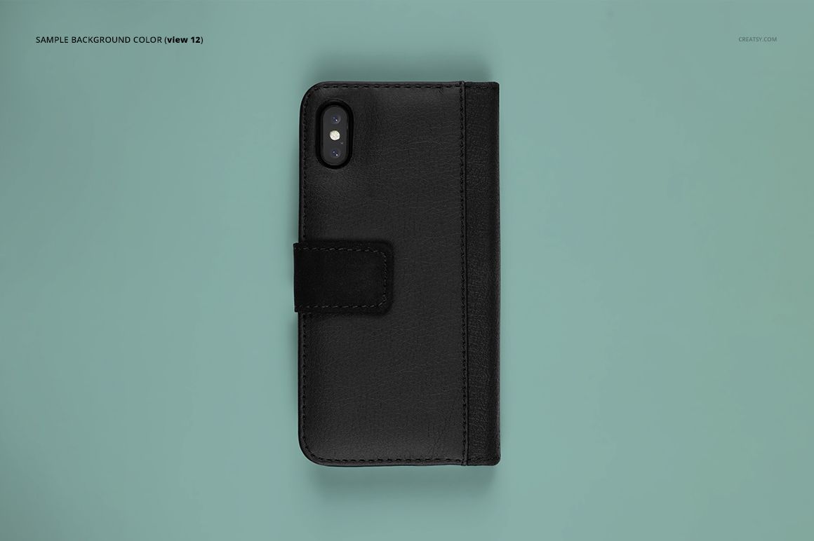 PSD mockup of a black iPhone X foldable case with textured finish, viewed from above on a teal background.