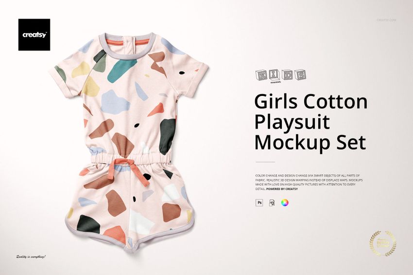 Front view of a girls cotton playsuit with short sleeves and shorts, featuring a pastel abstract pattern on a mockup.