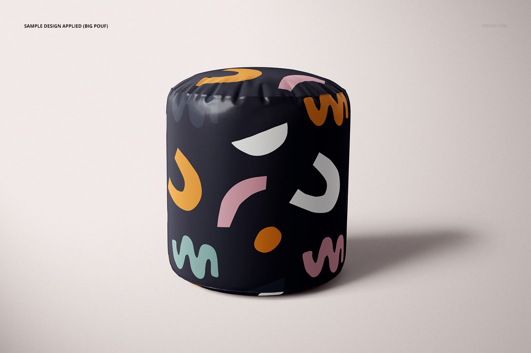 PSD mockup of a pouf in a home setting, decorated with playful geometric motifs and a neutral background.