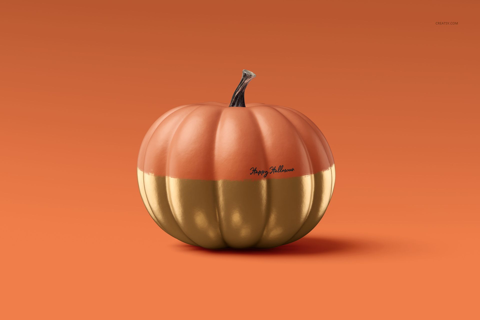 Single pumpkin mockup with metallic gold and matte orange finish, displayed against a solid orange backdrop.