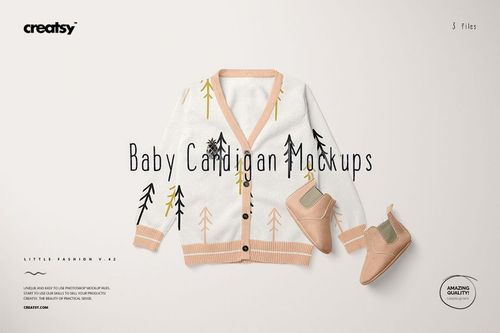 Front view of a baby cardigan sweater mockup with a white base, pastel yellow and black tree patterns, paired with beige baby shoes.