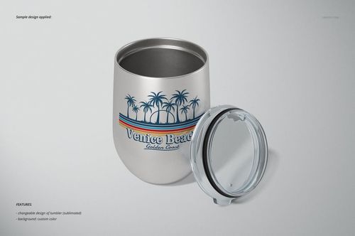 Front view of a 12 oz stemless wine cup with a removable transparent lid, featuring a palm tree and stripe design.