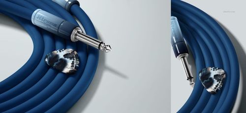 PSD mockup featuring a coiled blue guitar cable and a black and white patterned pick from a top perspective.