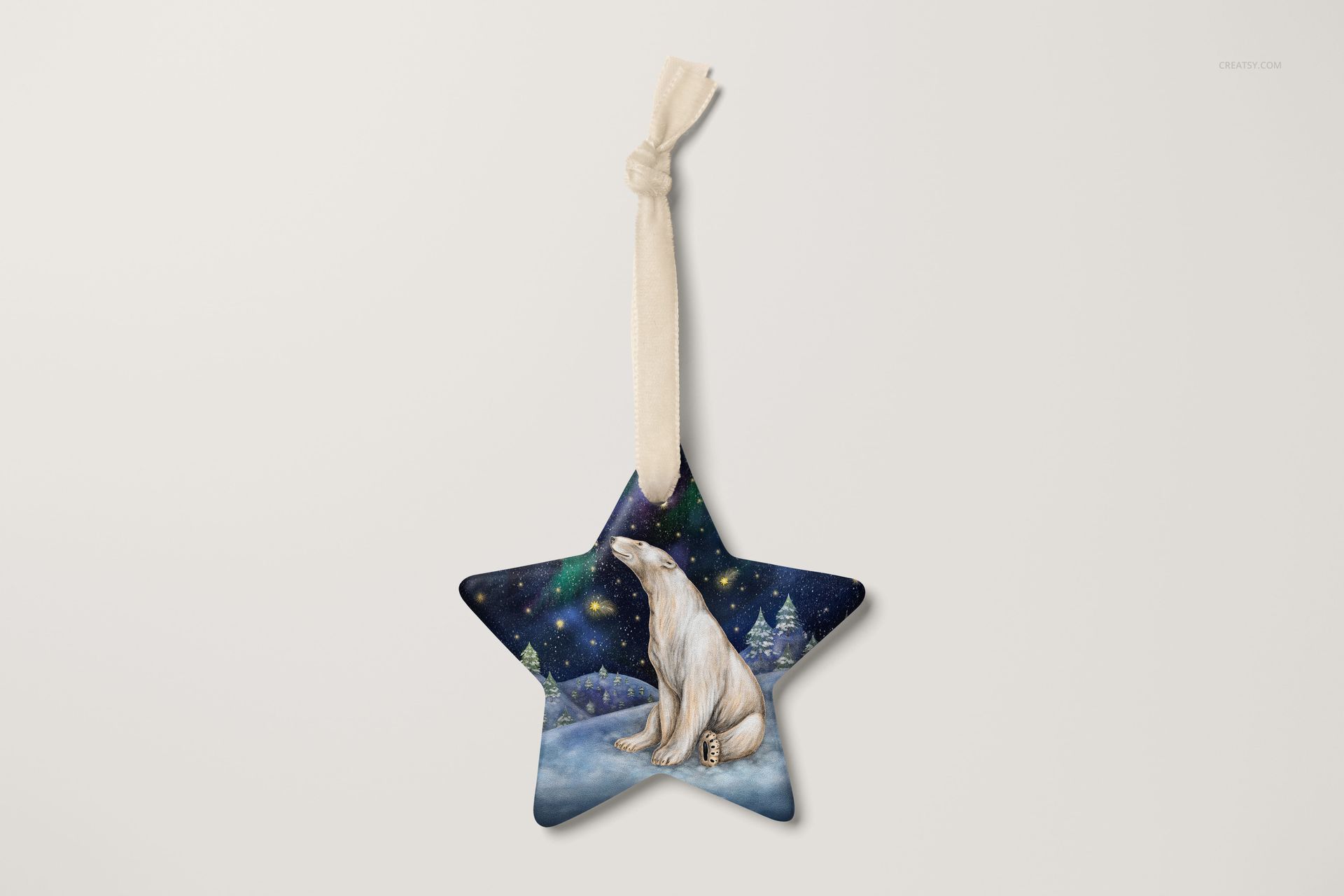 Star-shaped Christmas ornament mockup featuring a polar bear illustration against a snowy night sky background.