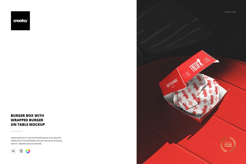 PSD mockup featuring a red burger box with a white wrapped burger, displayed on a bright red table in sunlight.