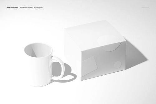 Minimalist mockup showing a white mug next to a blank white packaging box with soft shadows, front perspective.