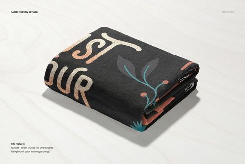 Front view of a folded throw blanket mockup showing woven texture and colorful design elements on a pale background.