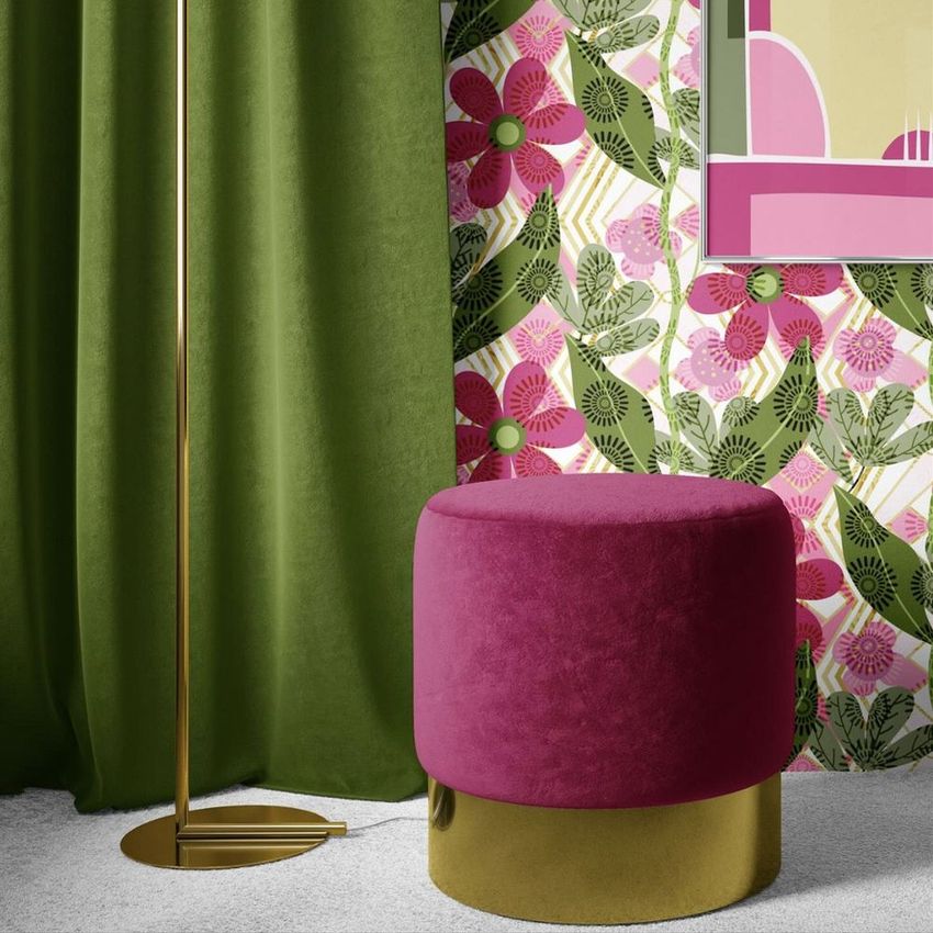 Interior scene mockup featuring a round magenta and gold ottoman, green curtain, and floral wallpaper with pink flowers.