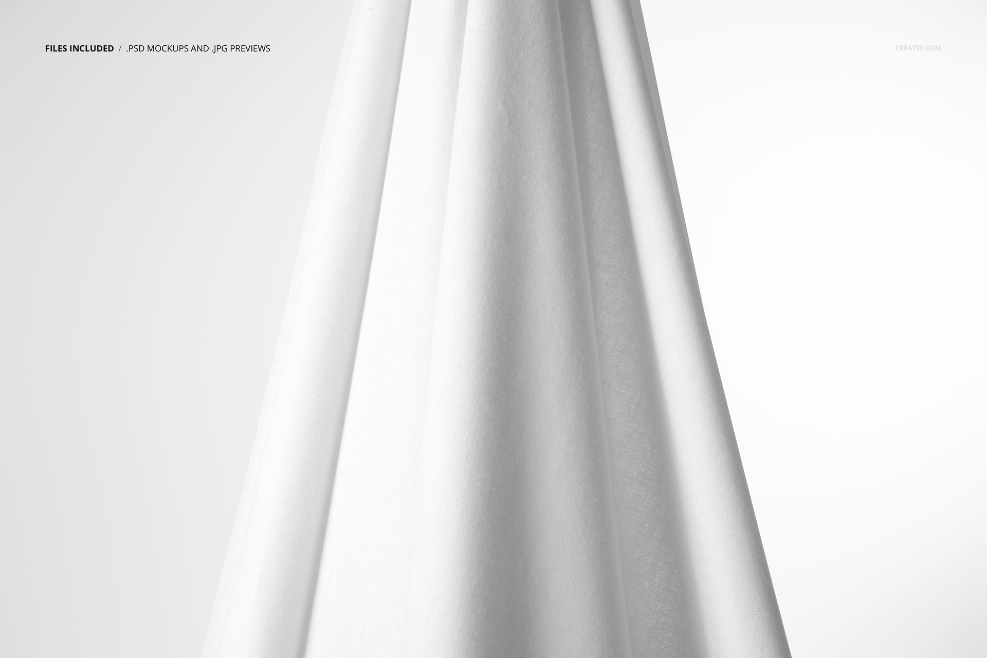 Hanging cotton fabric mockup in a vertical arrangement, featuring a soft white surface and gentle fabric creases.