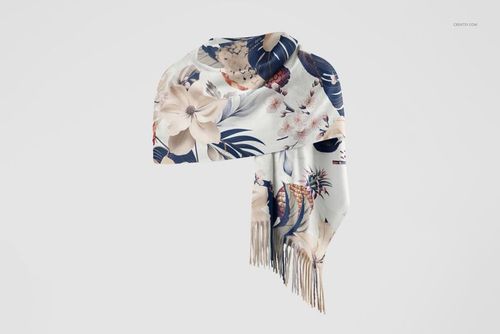 Front view of a cashmere scarf mockup with a floral pattern in pastel and navy tones, draped and showing fringed edges.