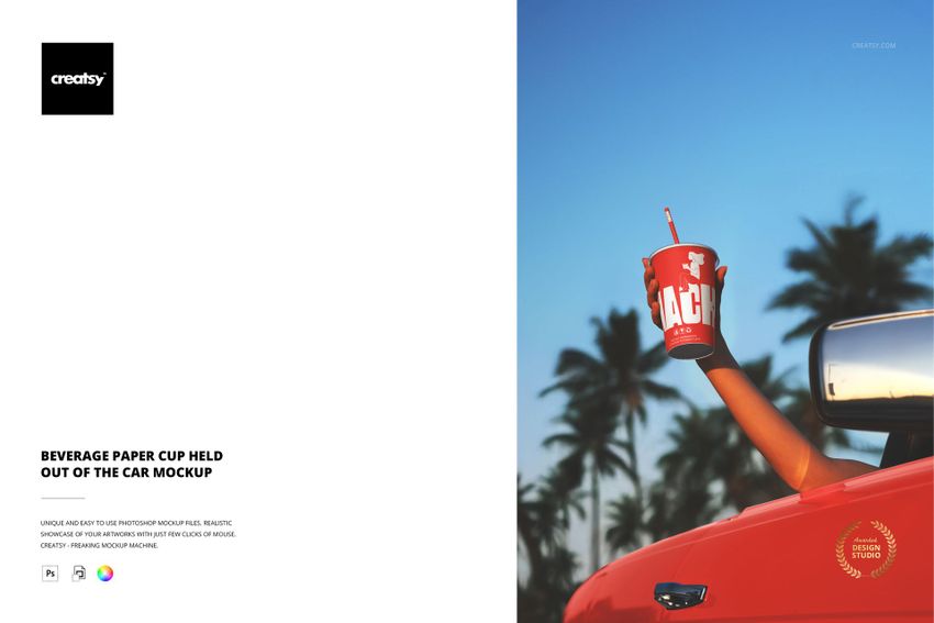 Red paper drink cup held by a hand outside a car, palm trees and clear sky visible in the background, PSD mockup scene.