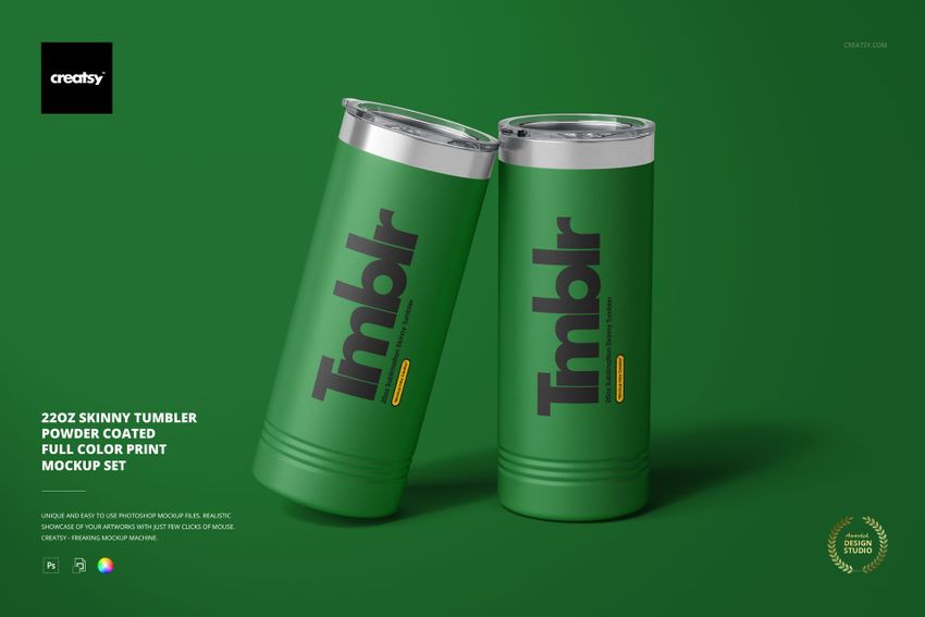PSD mockup of a pair of green skinny tumblers with metallic tops, displayed on a seamless green surface.
