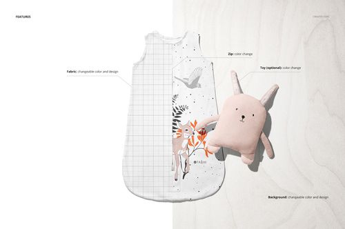 Baby wearable blanket mockup shown in a split design with deer and bird illustration, accompanied by a plush toy on a light wood surface.