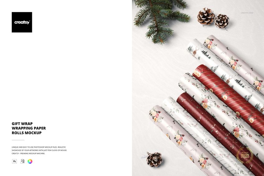 PSD mockup showing seven holiday gift wrap rolls with festive designs, flat lay style, and natural props like pine cones.