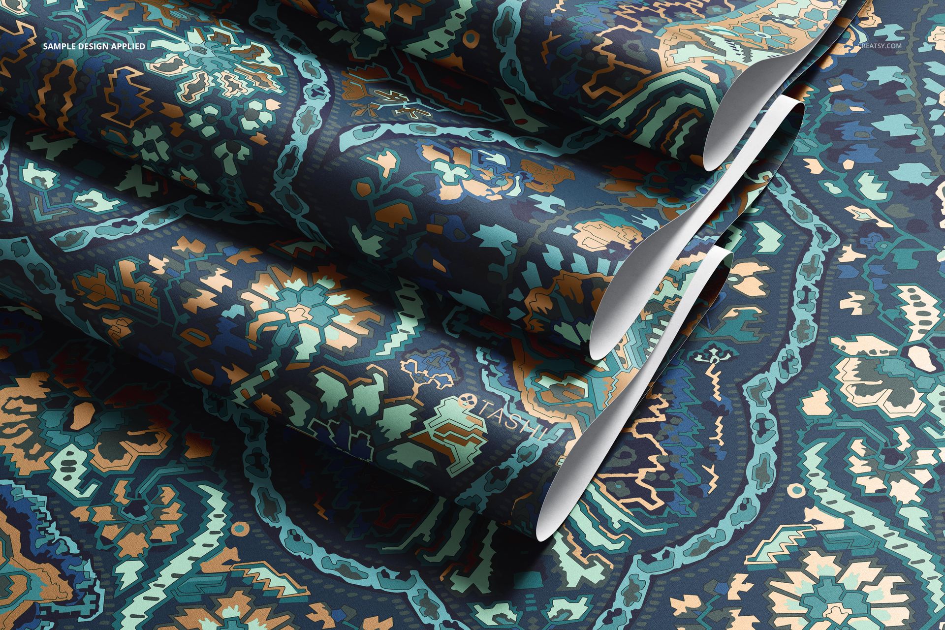 Paper wallpaper mockup featuring overlapping rolls with detailed floral motifs in dark blue, teal, and orange colors.